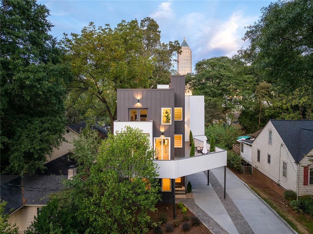 1205 Holly Street Northwest, Unit B Atlanta, GA 30318 - Photo 51 of 81 an aerial view of a house with roof deck outdoor seating and green space
