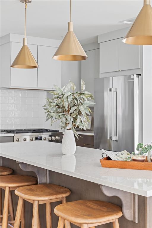 1205 Holly Street Northwest, Unit B Atlanta, GA 30318 - Photo 6 of 81 a room with table and chairs