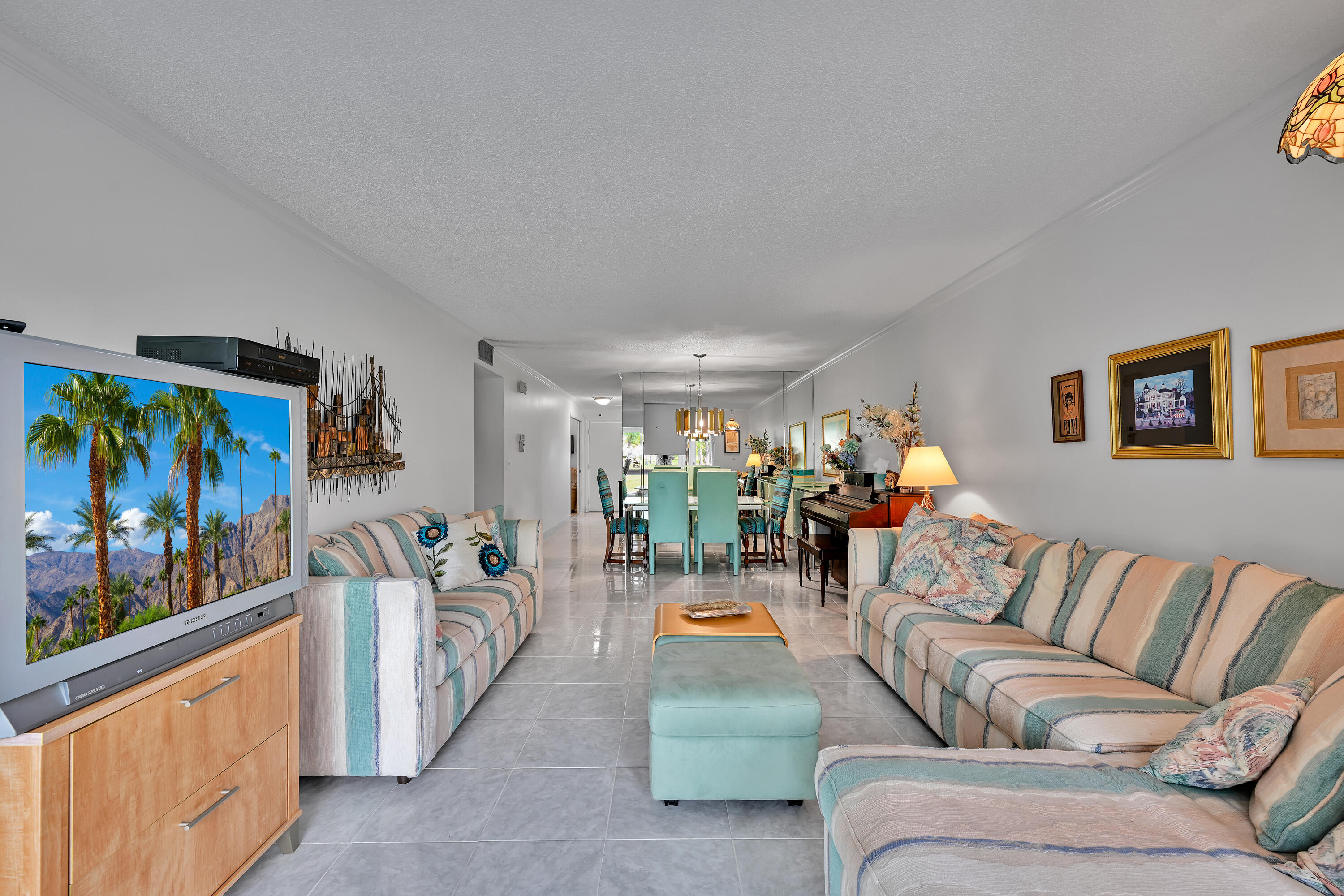 13791 Flora Place, Unit D Delray Beach, FL 33484 - Photo 9 of 24 a living room with furniture and a window