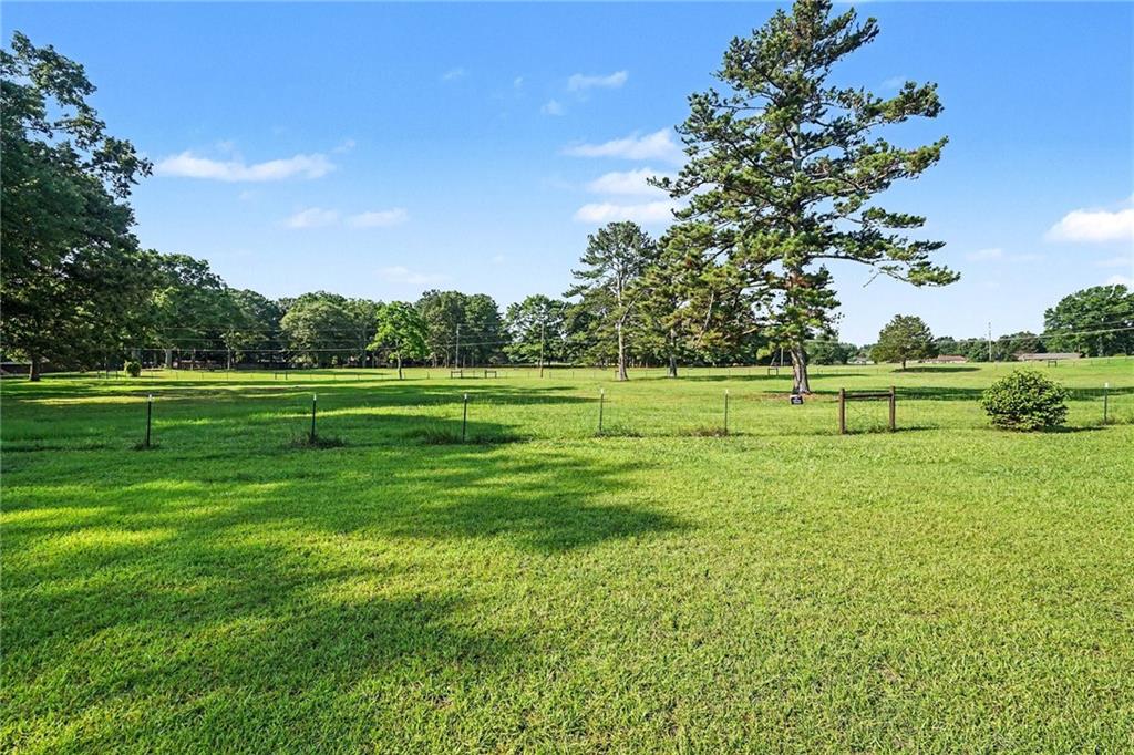 740 Smyrna Road Southwest Conyers, GA 30094 - Photo 27 of 27 a view of a park with large trees