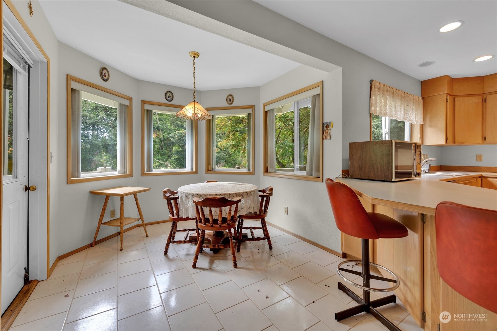93 North Harvey Road Blaine, WA 98230 - Photo 10 of 31 a view of a dining room with furniture window and outside view