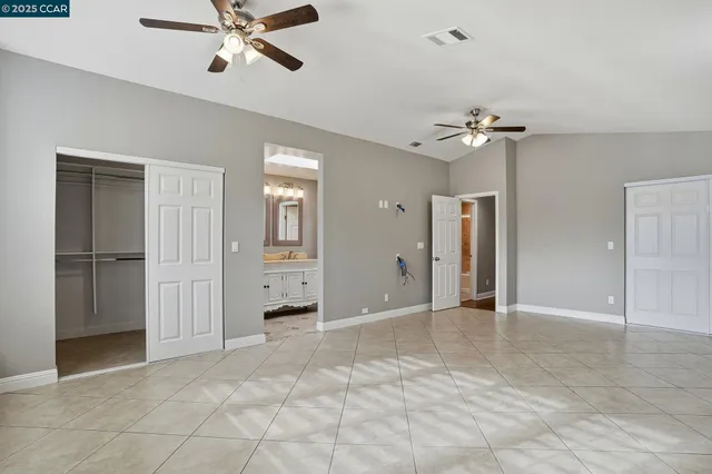 a view of a bedroom with a natural light