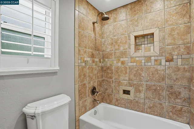 a bathroom with a sink vanity and mirror