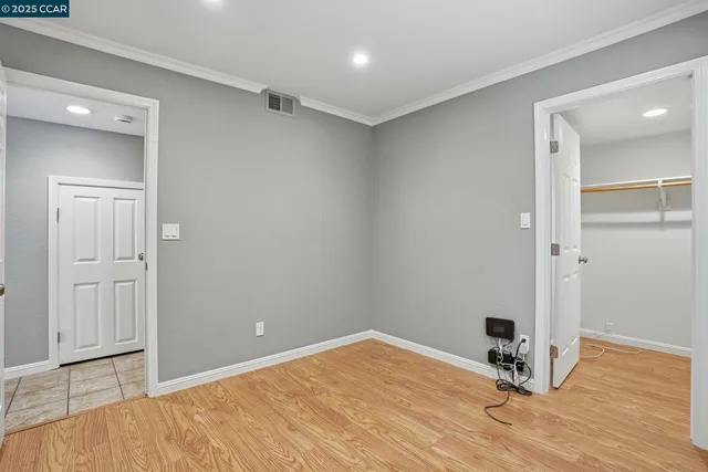 a bathroom with a sink toilet vanity and shower