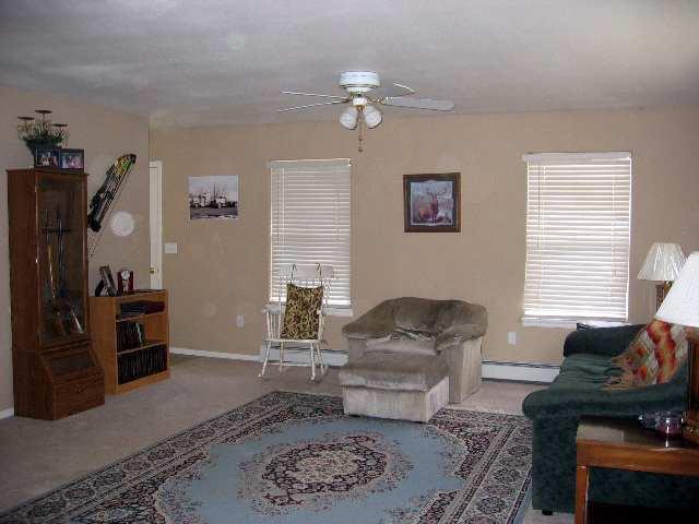 2757 Acacia Avenue Rifle, CO 81650 - Photo 3 of 9 a living room with furniture and a window