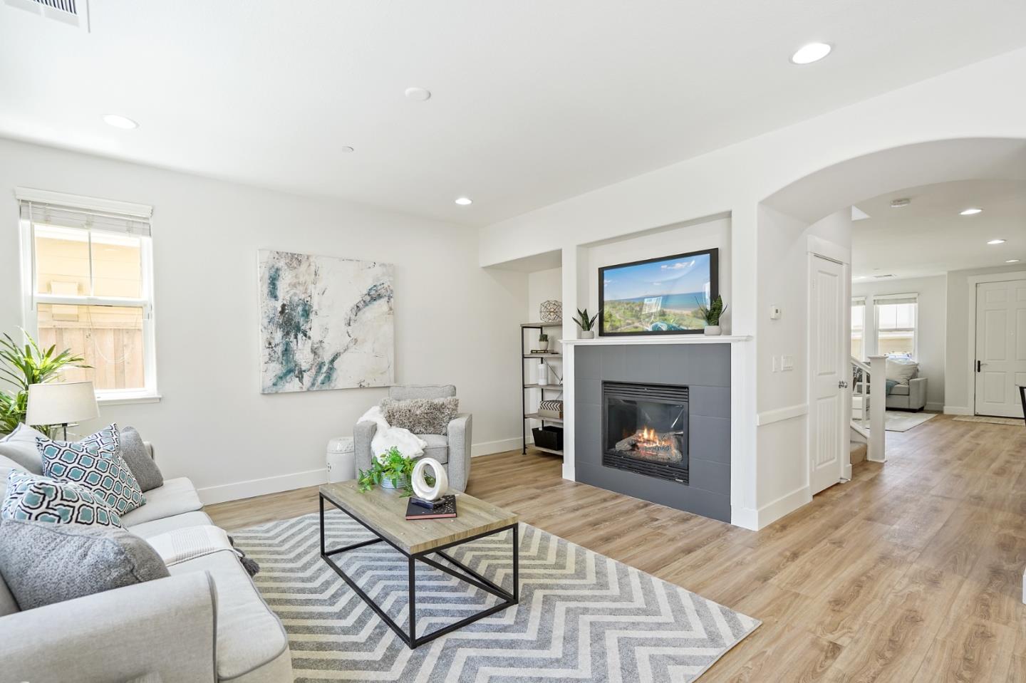 115 Cypress Street Pacifica, CA 94044 - Photo 11 of 59 a living room with furniture and a fireplace