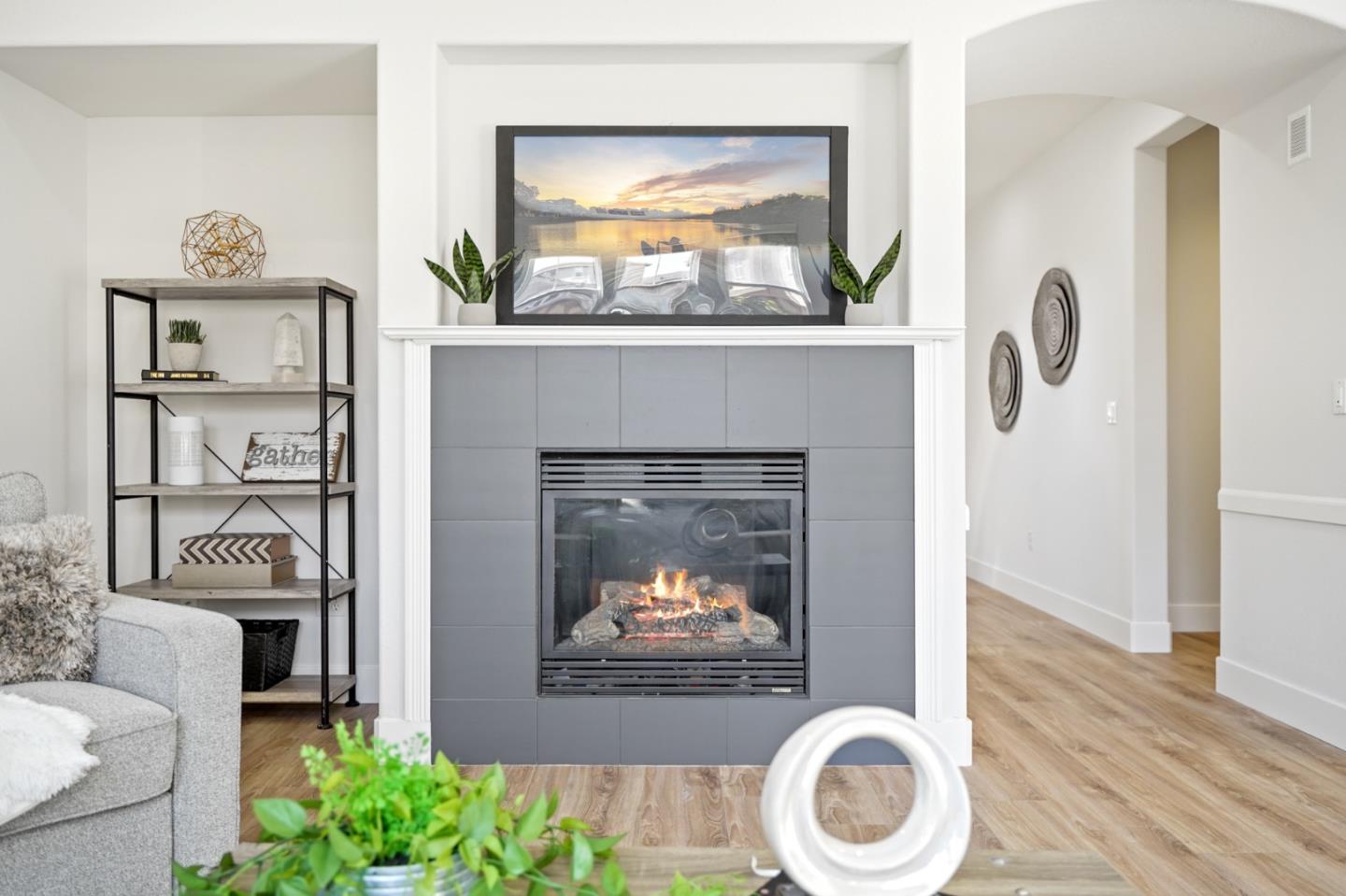 115 Cypress Street Pacifica, CA 94044 - Photo 12 of 59 a living room with a toilet and a fireplace