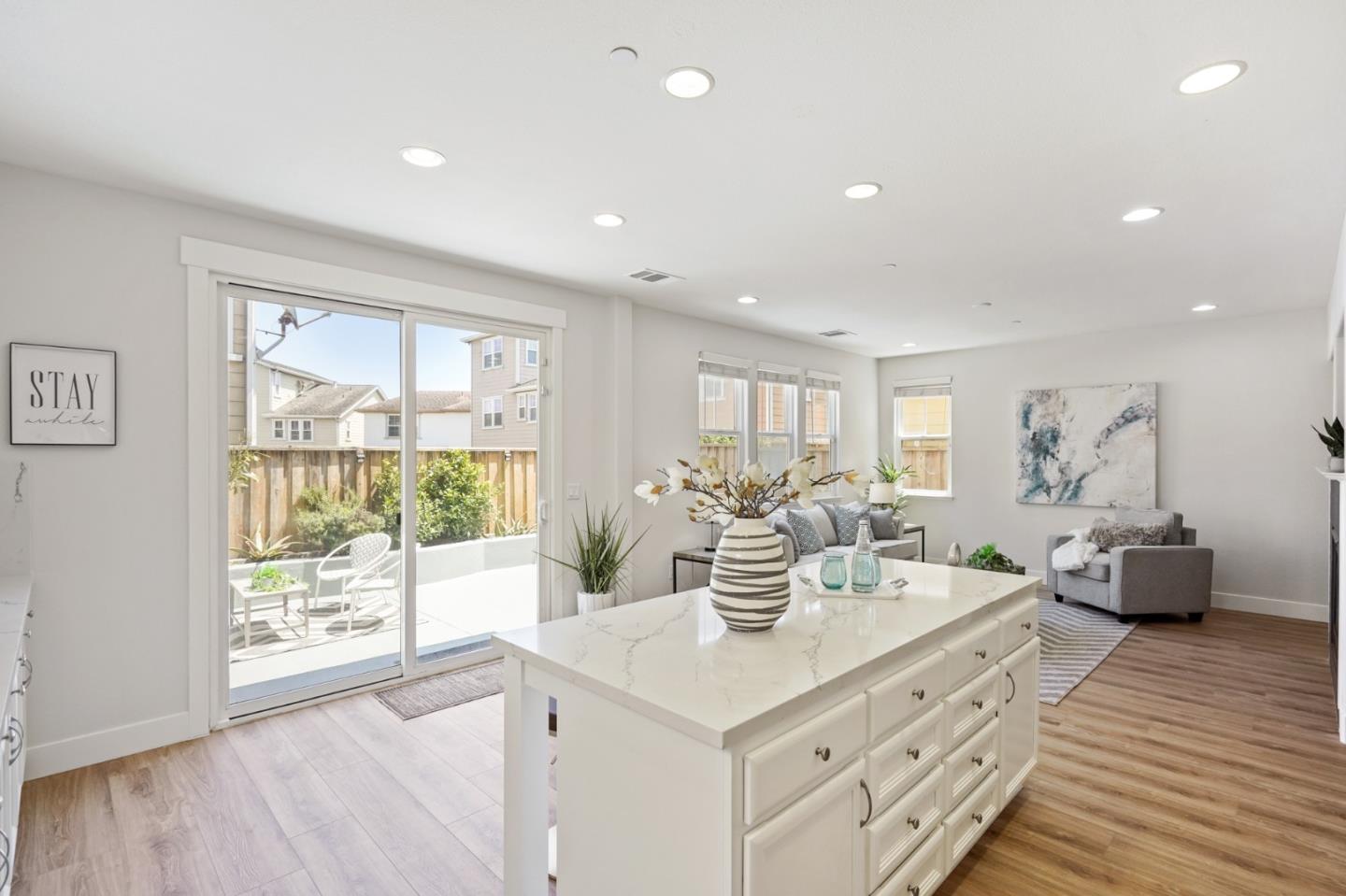 115 Cypress Street Pacifica, CA 94044 - Photo 15 of 59 a living room with furniture a wooden floor and window