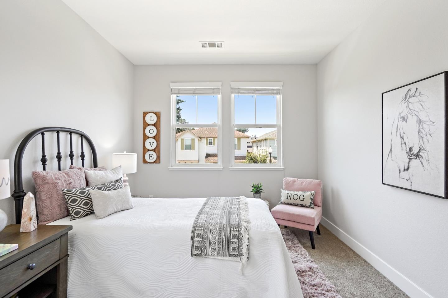 115 Cypress Street Pacifica, CA 94044 - Photo 22 of 59 a bedroom with a bed and a window