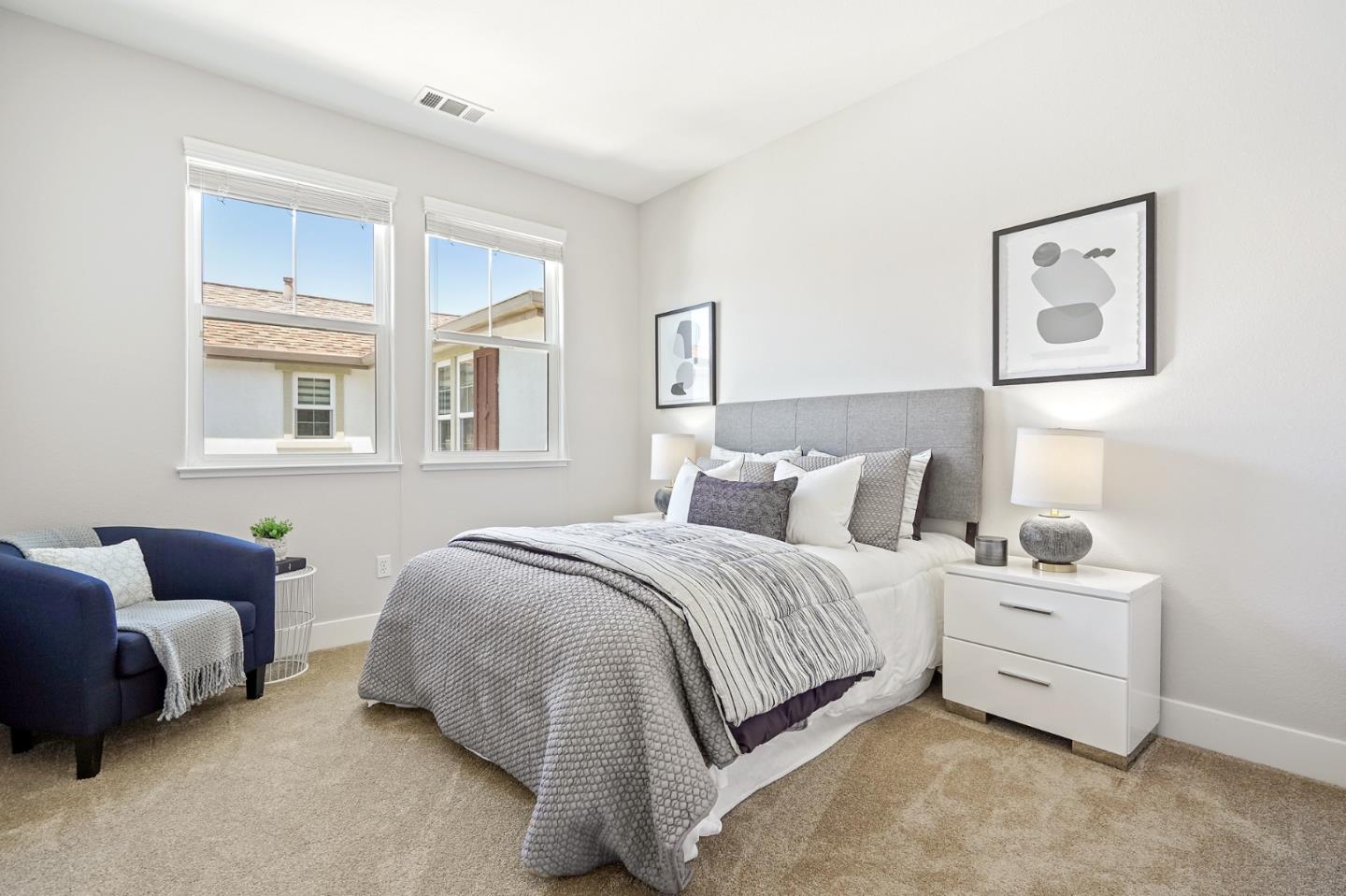 115 Cypress Street Pacifica, CA 94044 - Photo 23 of 59 a spacious bedroom with a bed and a couch