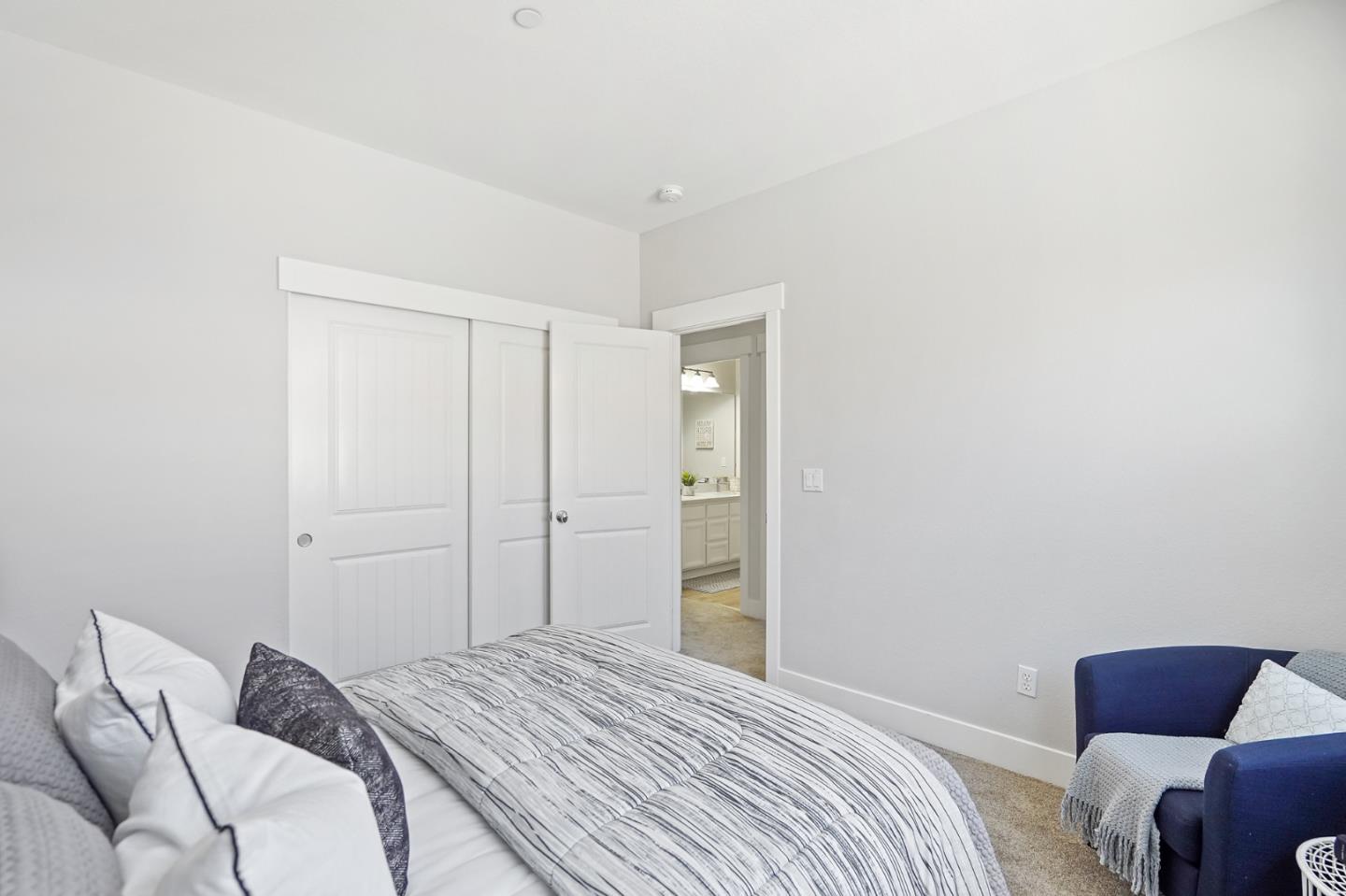 115 Cypress Street Pacifica, CA 94044 - Photo 24 of 59 a bedroom with a bed and a couch