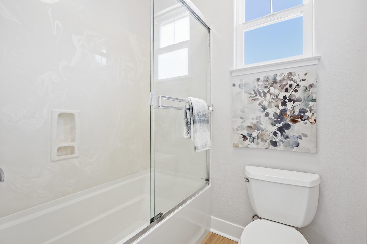 115 Cypress Street Pacifica, CA 94044 - Photo 27 of 59 a bathroom with a toilet and a shower