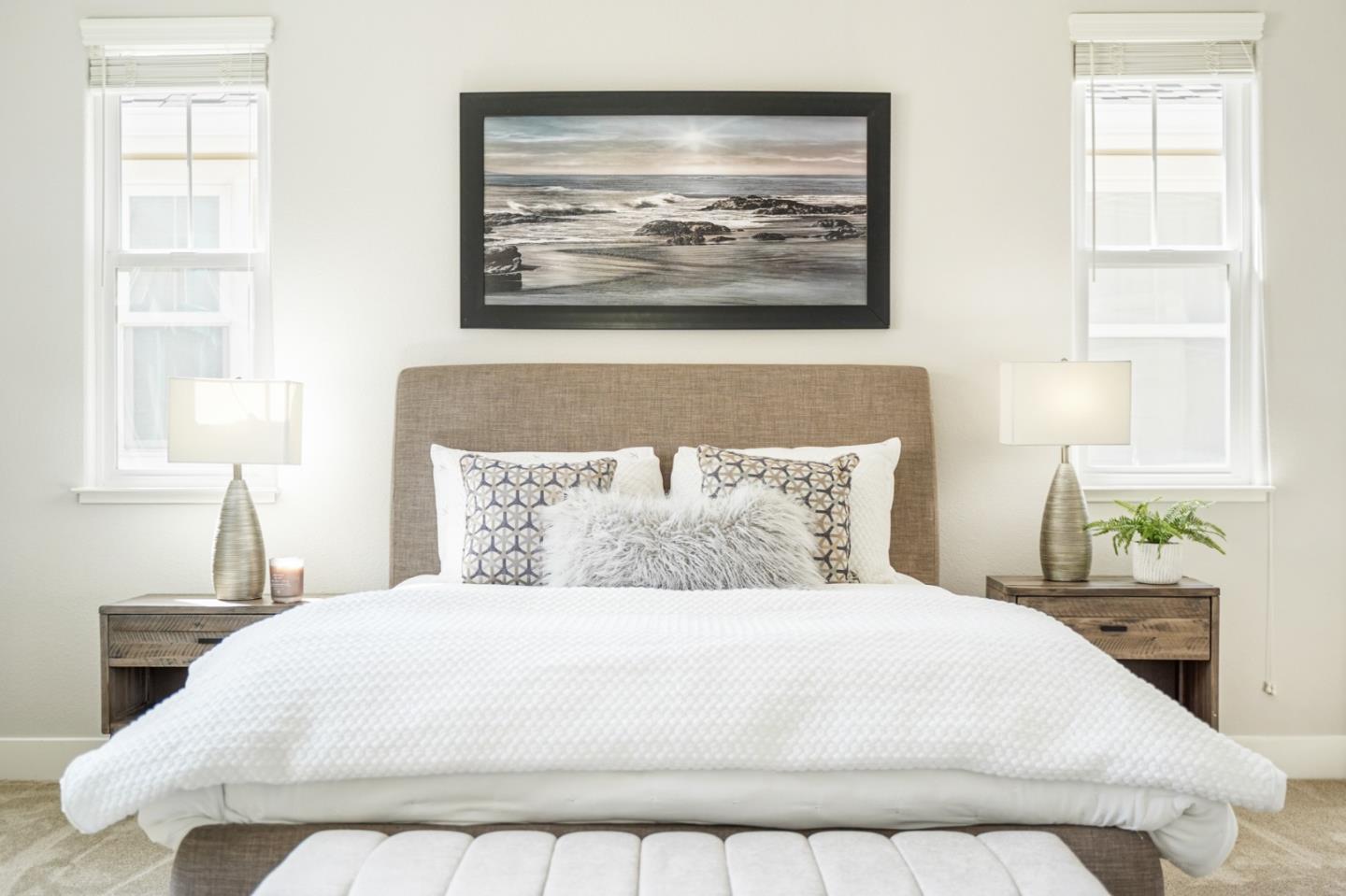 115 Cypress Street Pacifica, CA 94044 - Photo 31 of 59 a bedroom with a bed and a painting on the wall