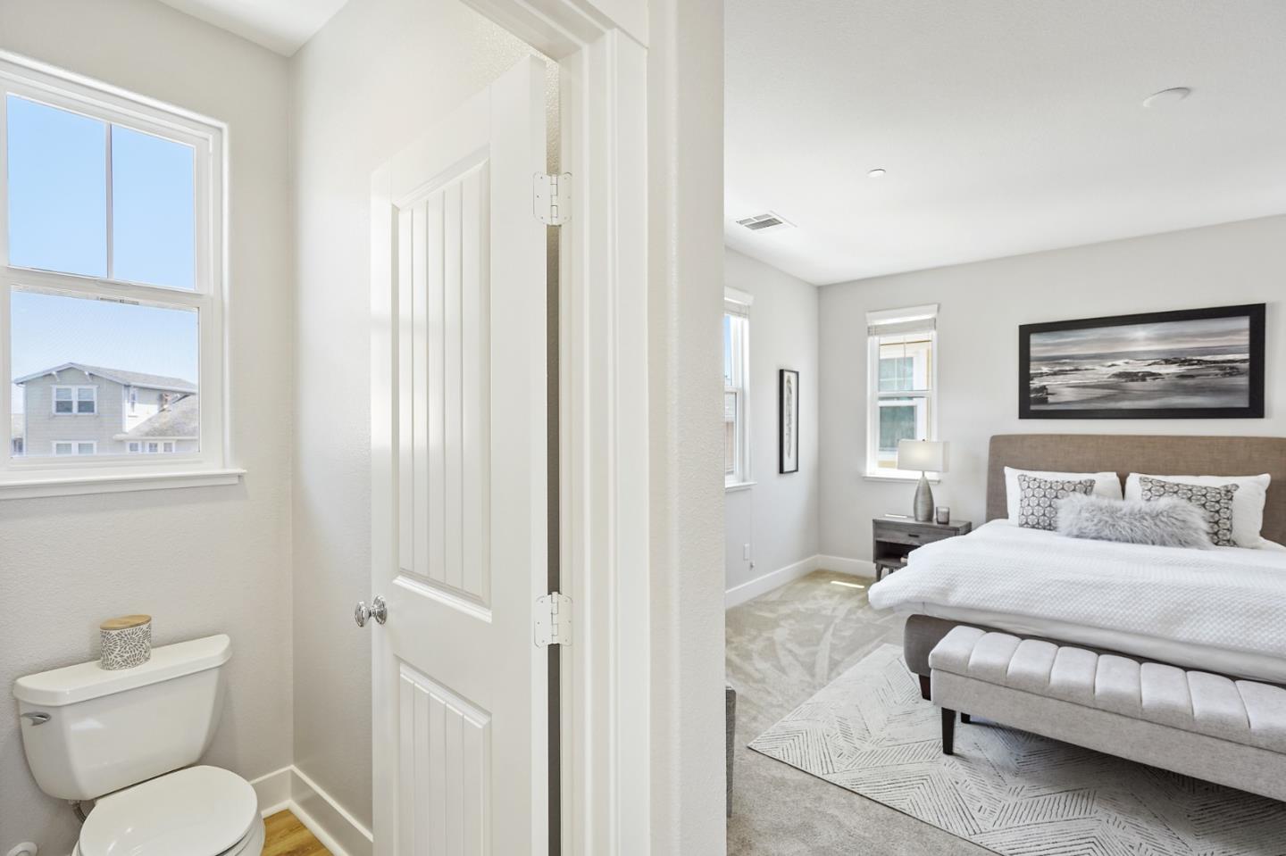 115 Cypress Street Pacifica, CA 94044 - Photo 33 of 59 a bedroom with a bed and a painting on the wall