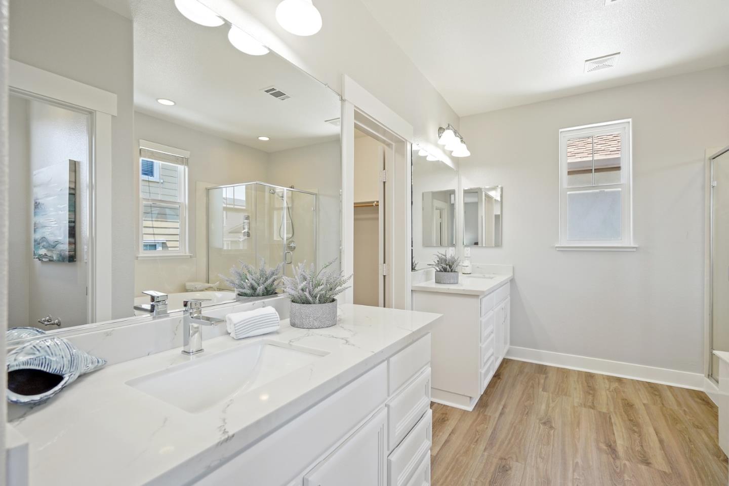 115 Cypress Street Pacifica, CA 94044 - Photo 34 of 59 a spacious bathroom with a double vanity sink a mirror and a bathtub