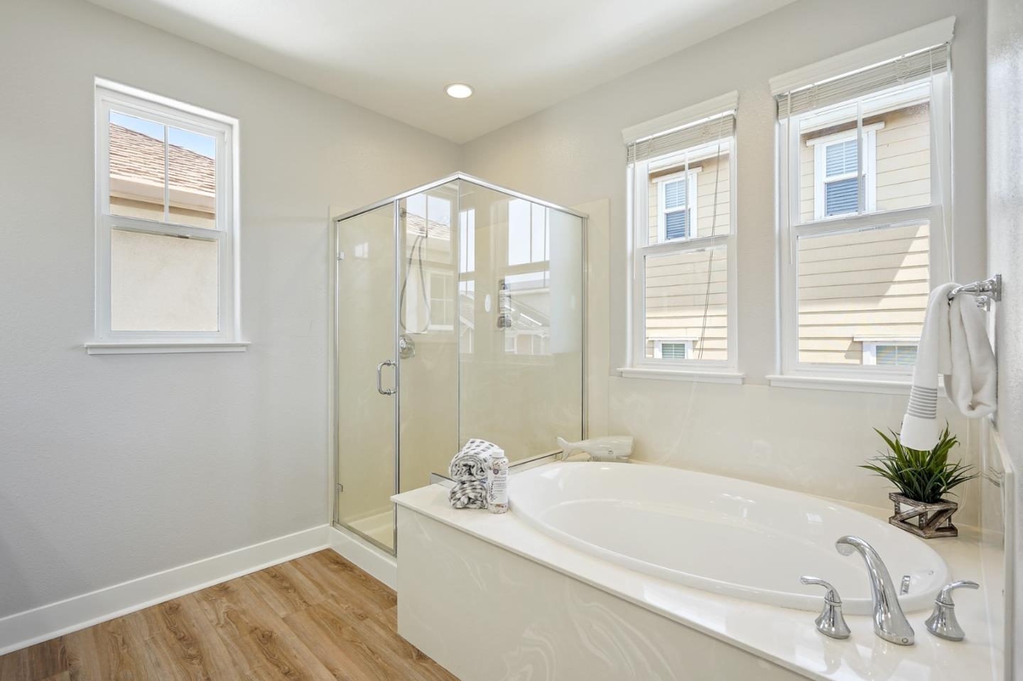 115 Cypress Street Pacifica, CA 94044 - Photo 35 of 59 a white bath tub sitting next to a window
