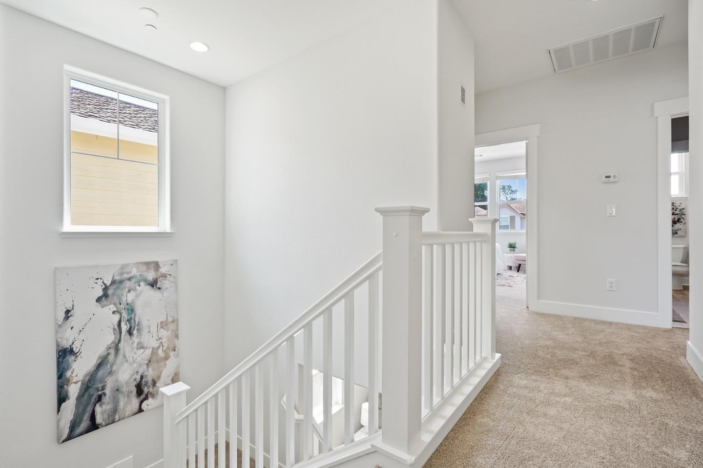 115 Cypress Street Pacifica, CA 94044 - Photo 40 of 59 a view of a livingroom with wooden floor and stairs