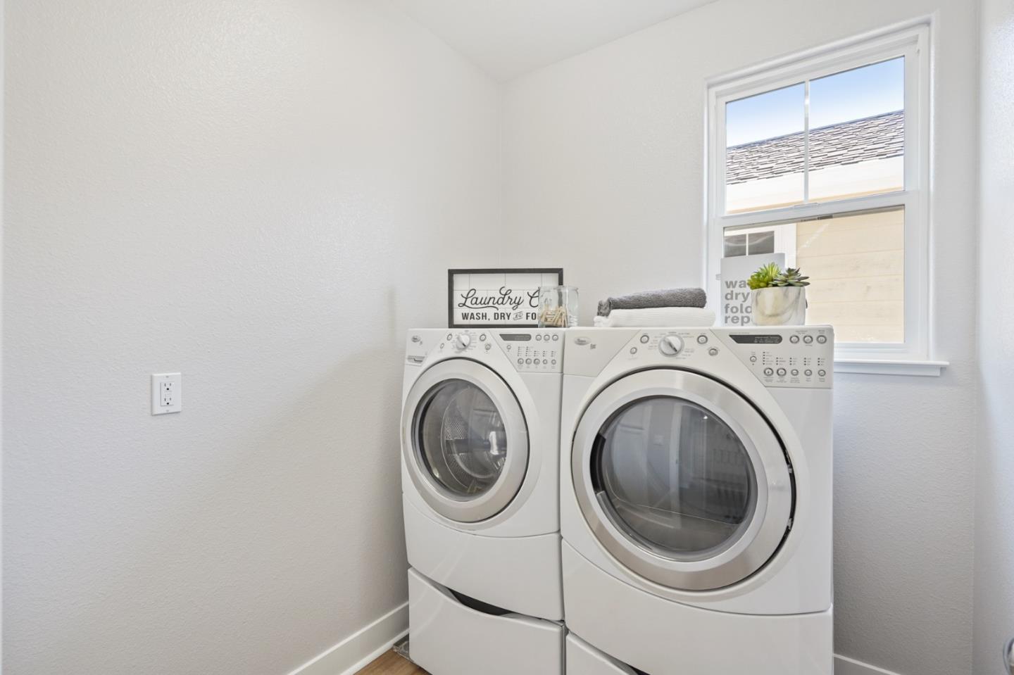 115 Cypress Street Pacifica, CA 94044 - Photo 41 of 59 a utility room with dryer and washer