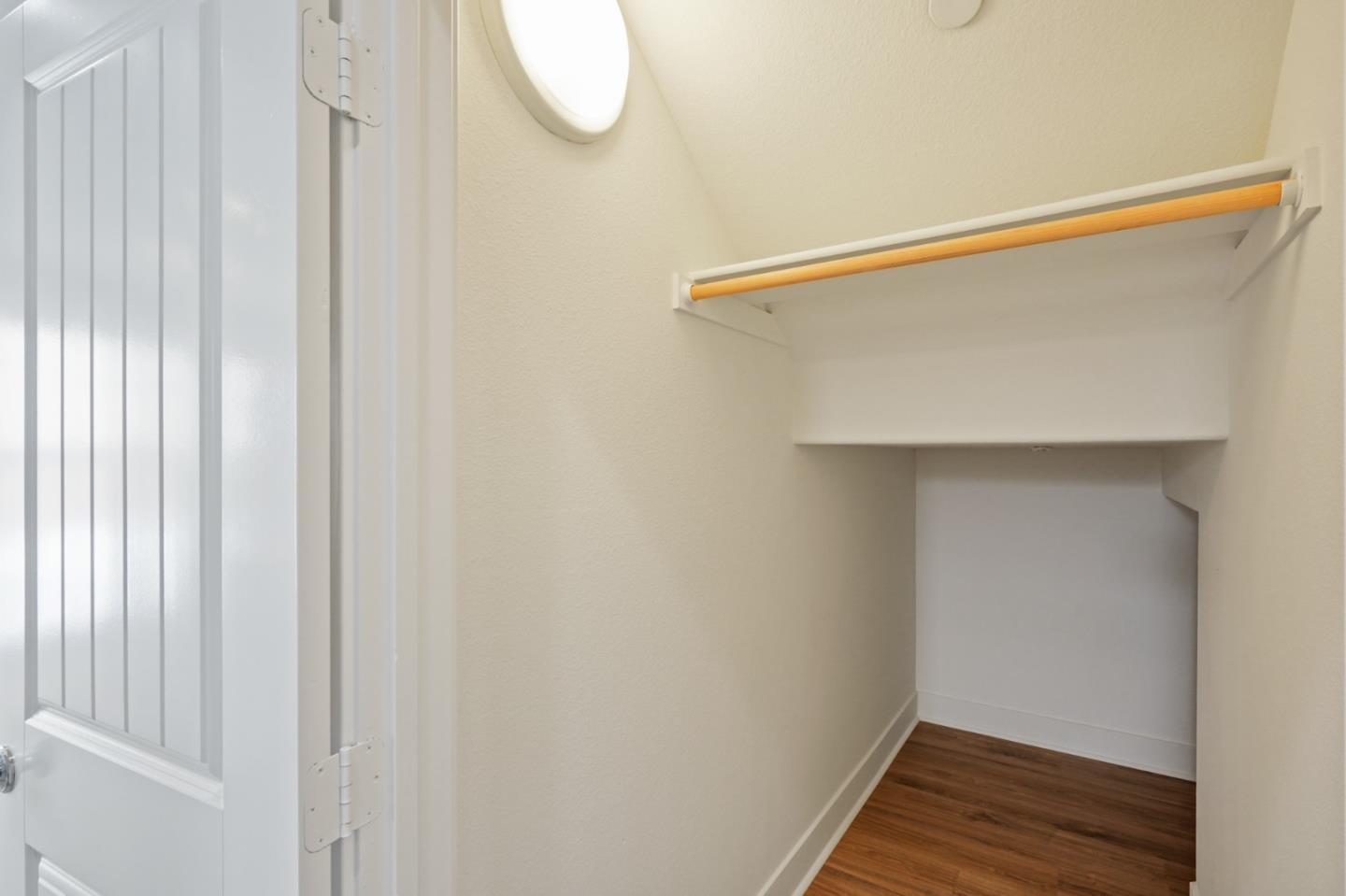 115 Cypress Street Pacifica, CA 94044 - Photo 42 of 59 a view of a hallway with wooden floor