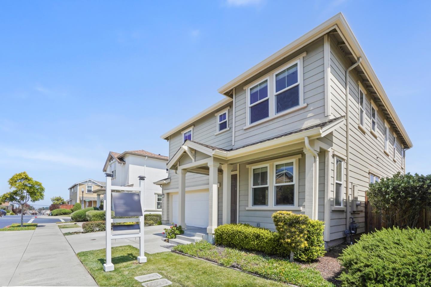 115 Cypress Street Pacifica, CA 94044 - Photo 49 of 59 a front view of a house with a yard