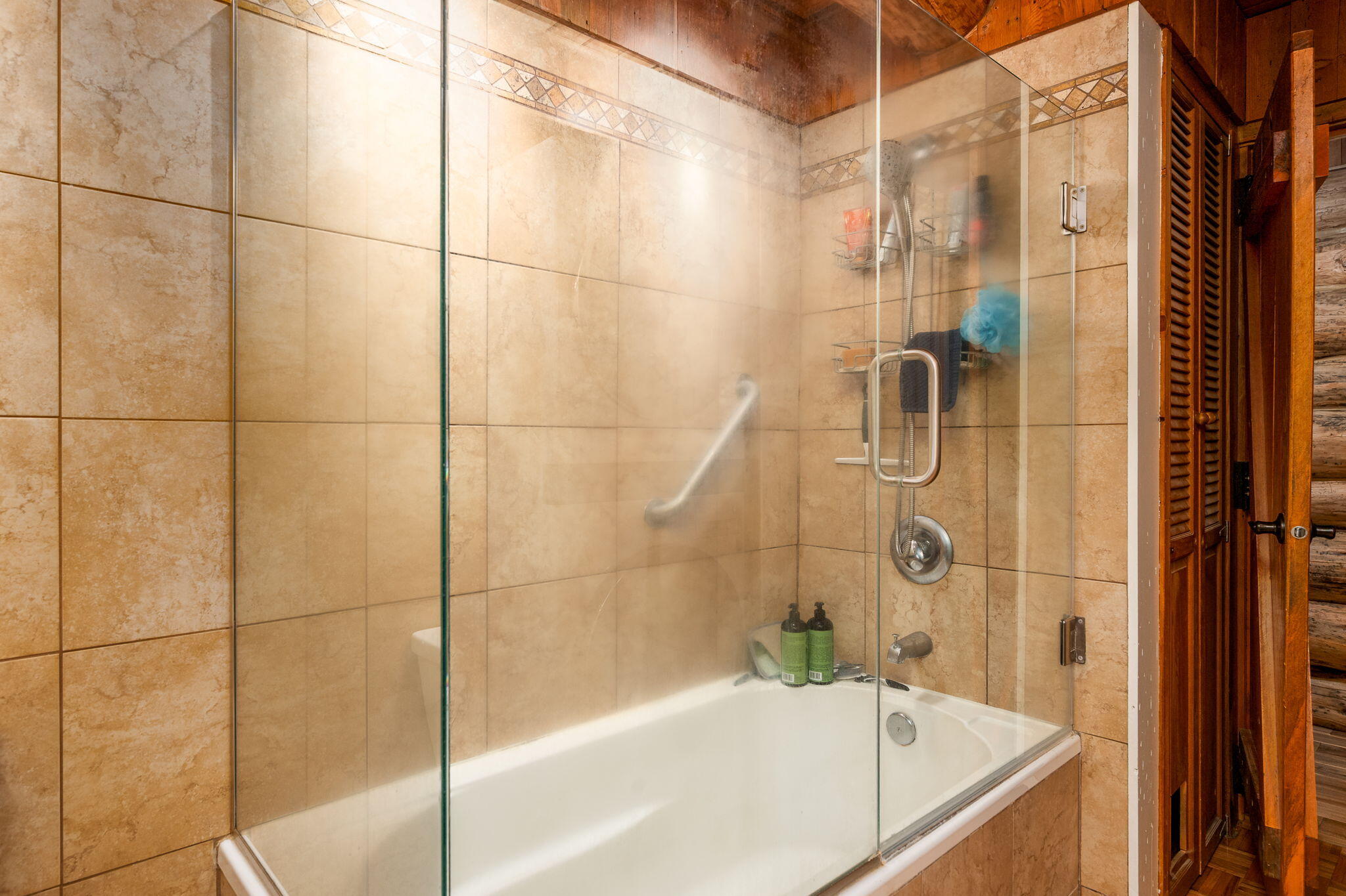 16011 Old Juniper Road Sisters, OR 97759 - Photo 18 of 41 a bathroom with a bathtub and shower