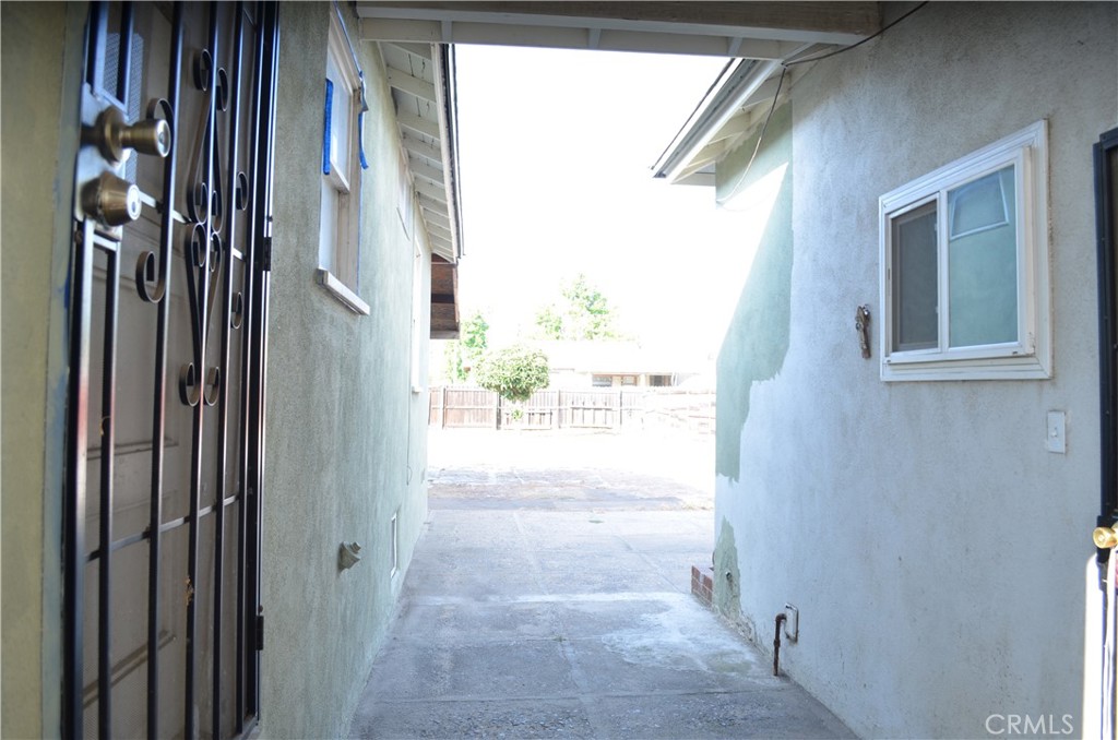 4139 St George Place Riverside, CA 92504 - Photo 24 of 42 Middle entrance of the house to access to the garage or the kitchen