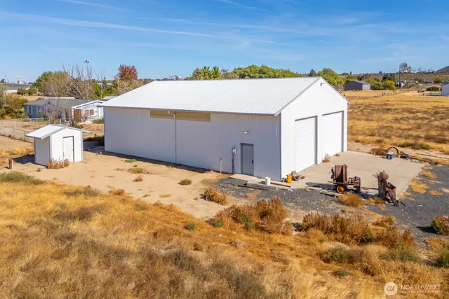 a view of a backyard of the house