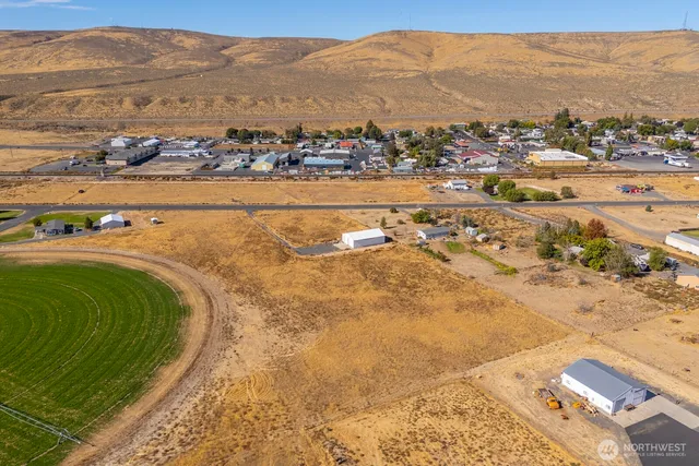 a view of a city with mountains in the background