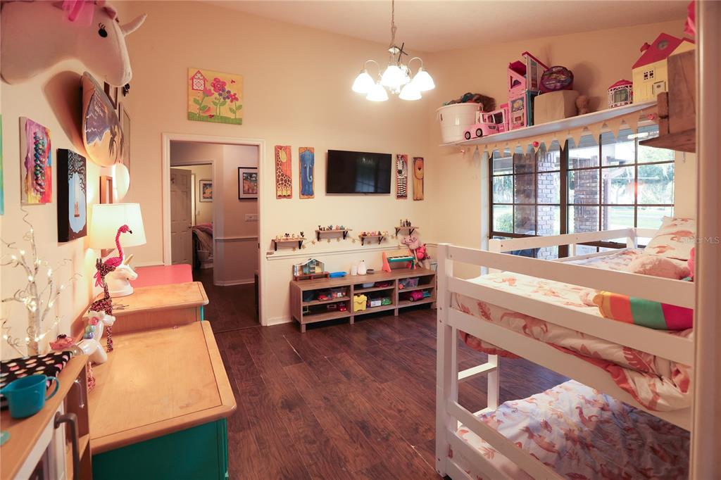 11923 Lake Butler Boulevard Windermere, FL 34786 - Photo 17 of 31 a living room with furniture and a flat screen tv