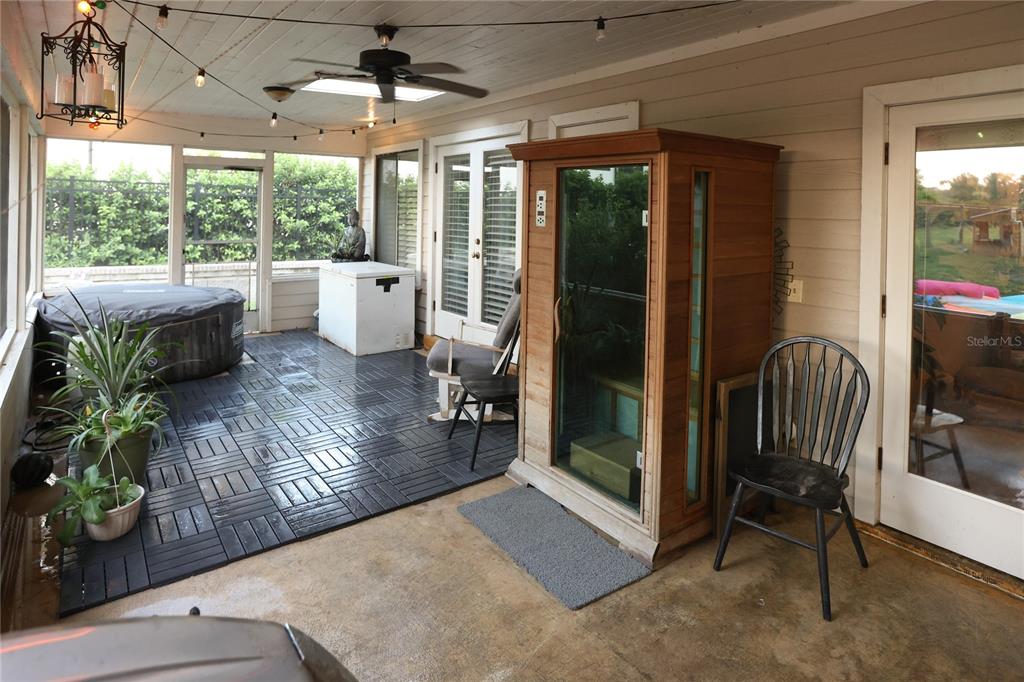 11923 Lake Butler Boulevard Windermere, FL 34786 - Photo 28 of 31 a view of a porch with chairs and backyard