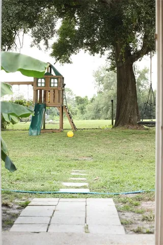 a view of a garden with a slide