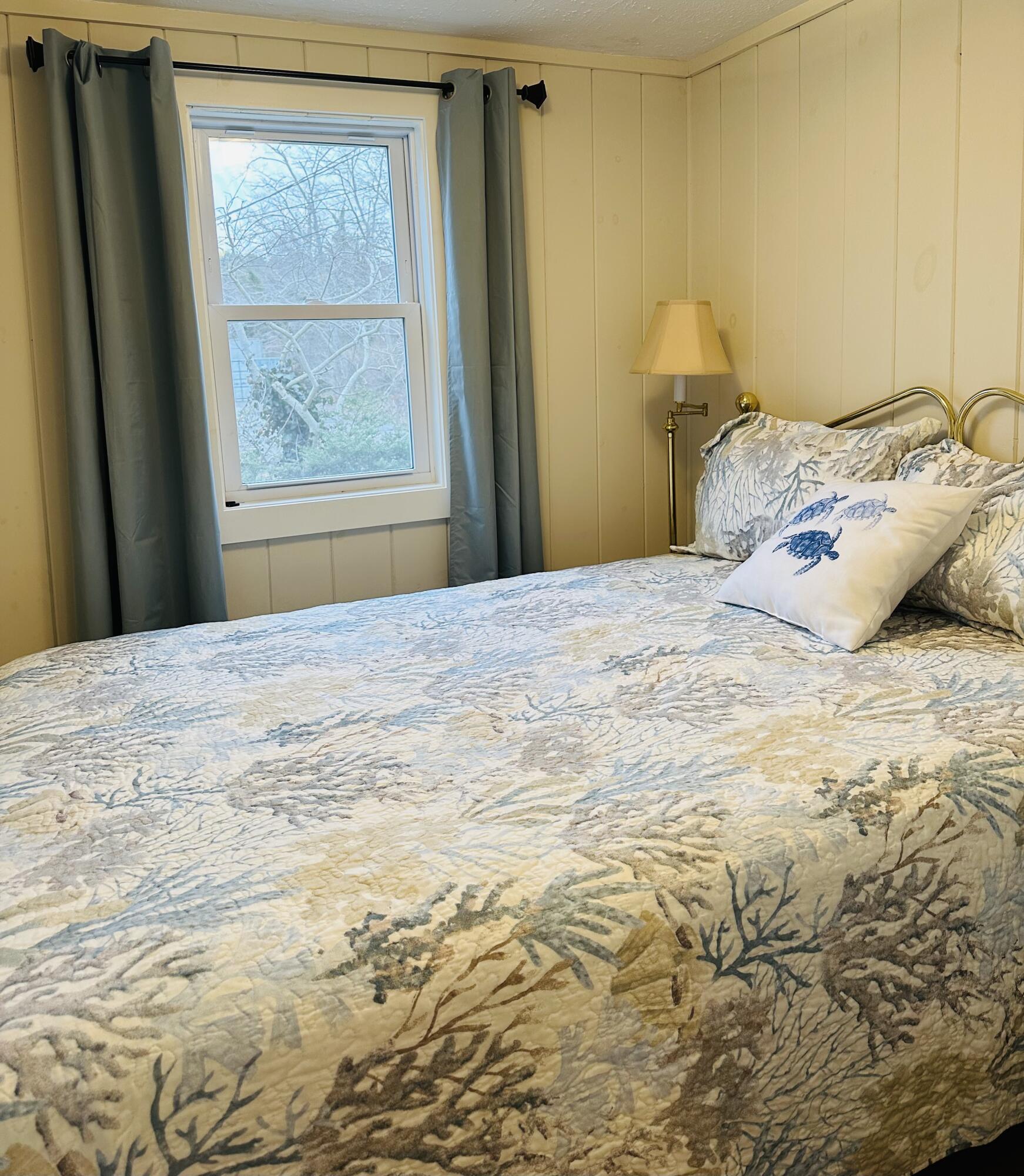 36 Cove Road Wellfleet, MA 02667 - Photo 15 of 22 a bedroom with a bed and a window