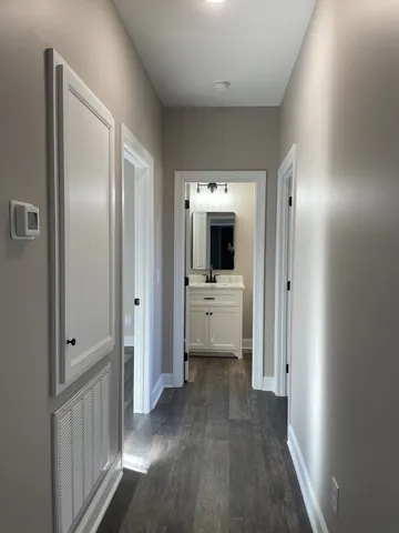 a bathroom with a sink a toilet and bathtub