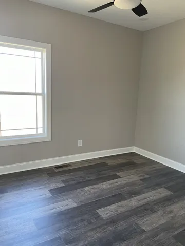 a view of an empty walk in closet