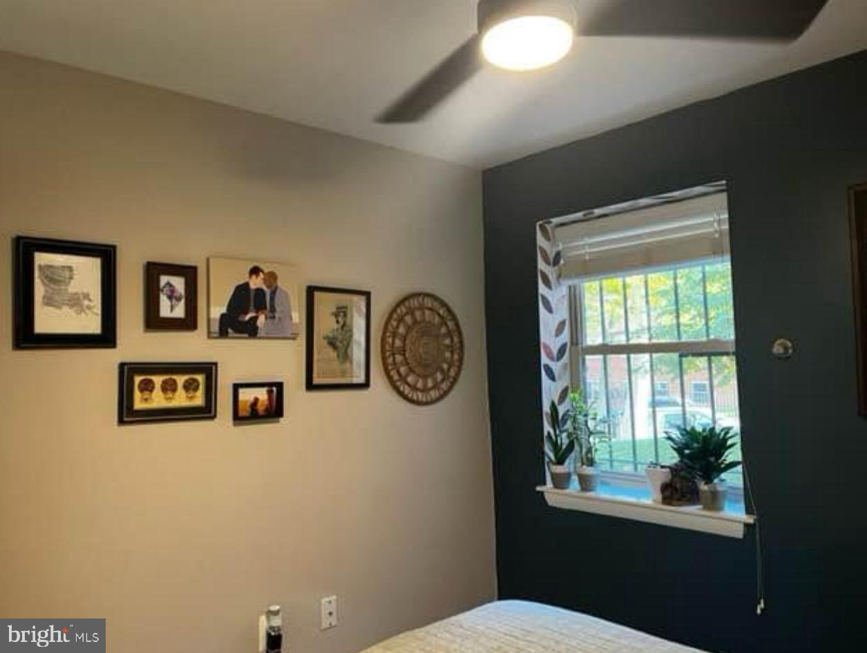 2655 Birney Place Southeast, Unit 101 Washington, DC 20020 - Photo 11 of 33 a bathroom with a toilet a window and a shower