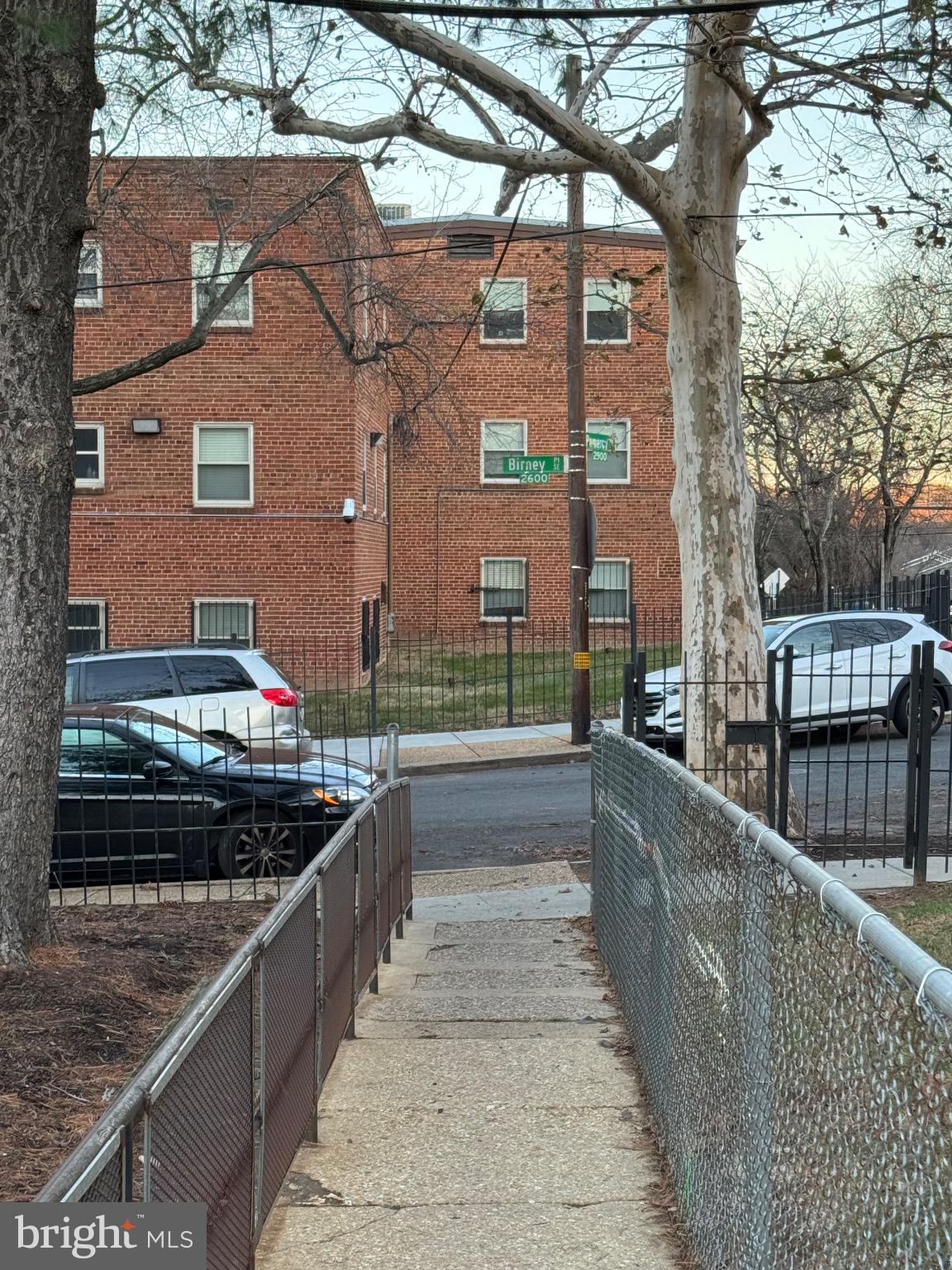 2655 Birney Place Southeast, Unit 101 Washington, DC 20020 - Photo 33 of 33 a view of a brick building from a balcony