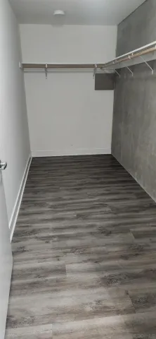 a view of an empty walk in closet