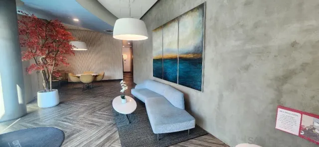 a room with furniture and a chandelier