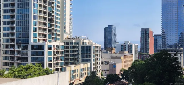 a view of a city with tall buildings