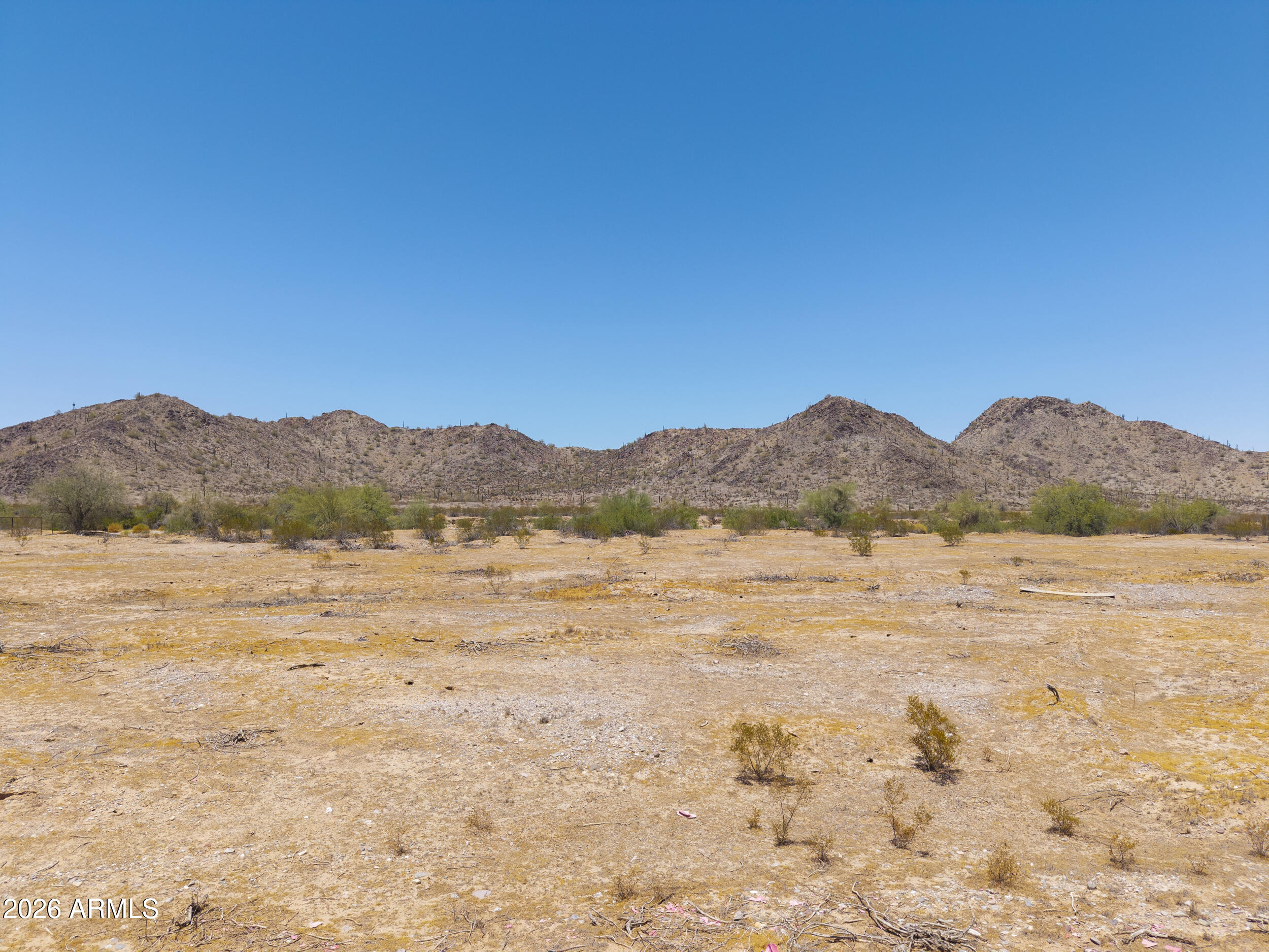 54650 West Ivory Road, Unit 57 Maricopa, AZ 85139 - Photo 17 of 17 a view of lake and mountain
