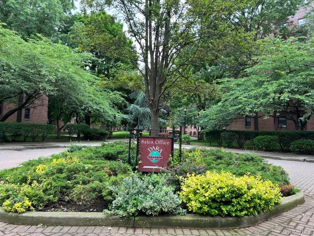 150-29 72nd Road, Unit 5C Queens, NY 11367 - Photo 31 of 34 a view of a garden with a fountain