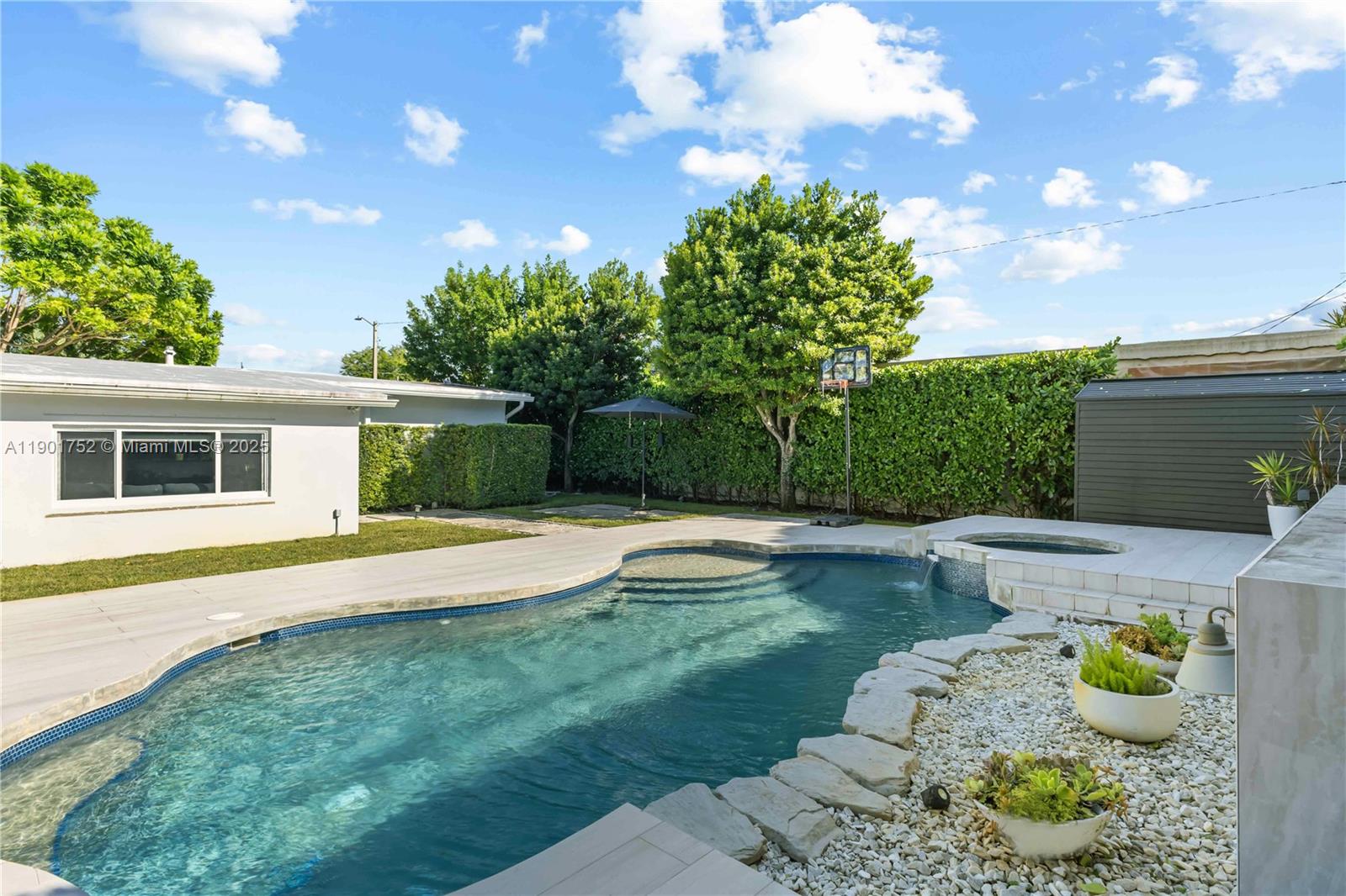 5344 Southwest 90th Court Miami, FL 33165 - Photo 8 of 13 a front view of a house with garden