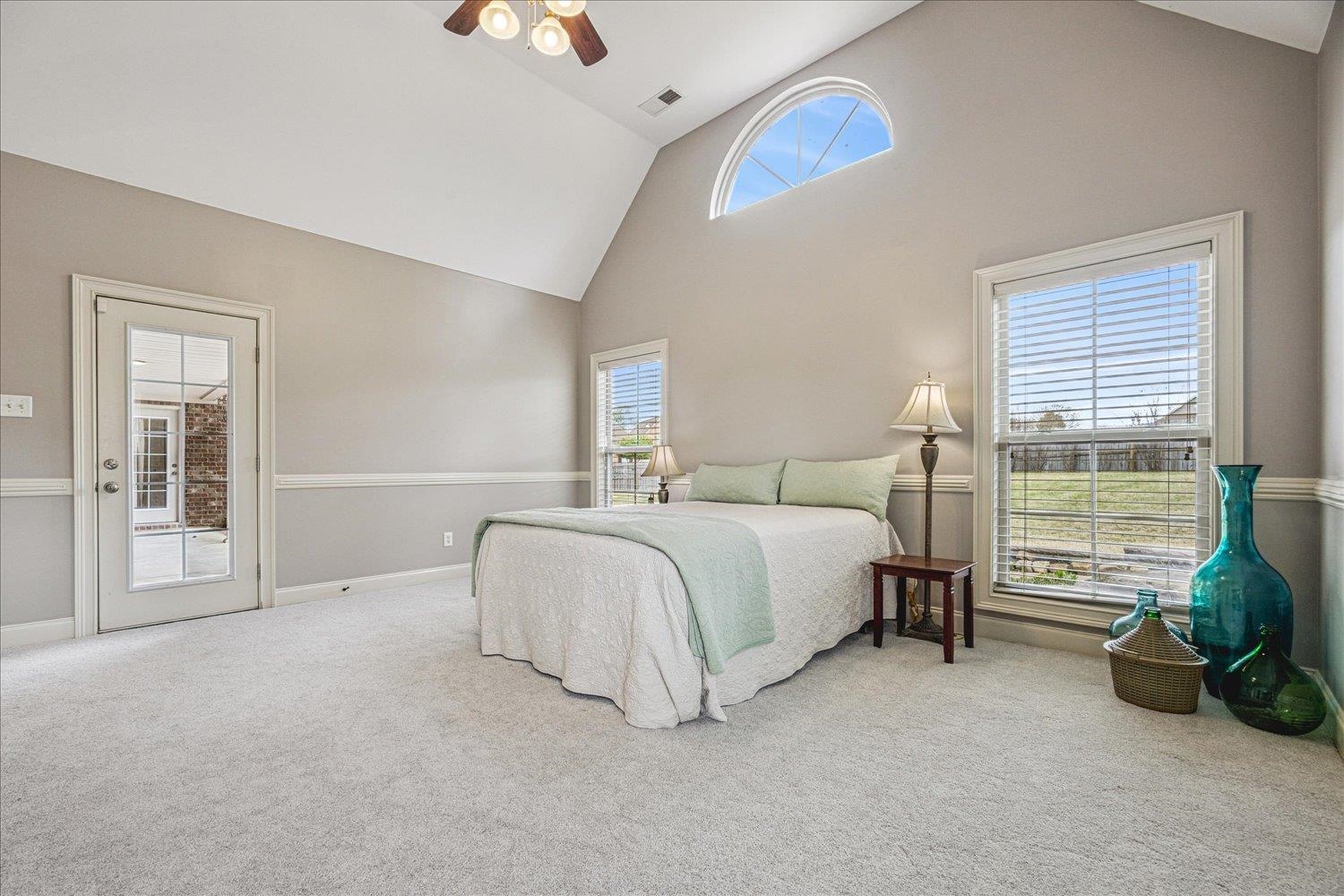 142 Clementine Road Atoka, TN 38004 - Photo 16 of 37 Vaulted ceiling, private door to covered patio, & new STAINMASTER® carpet.