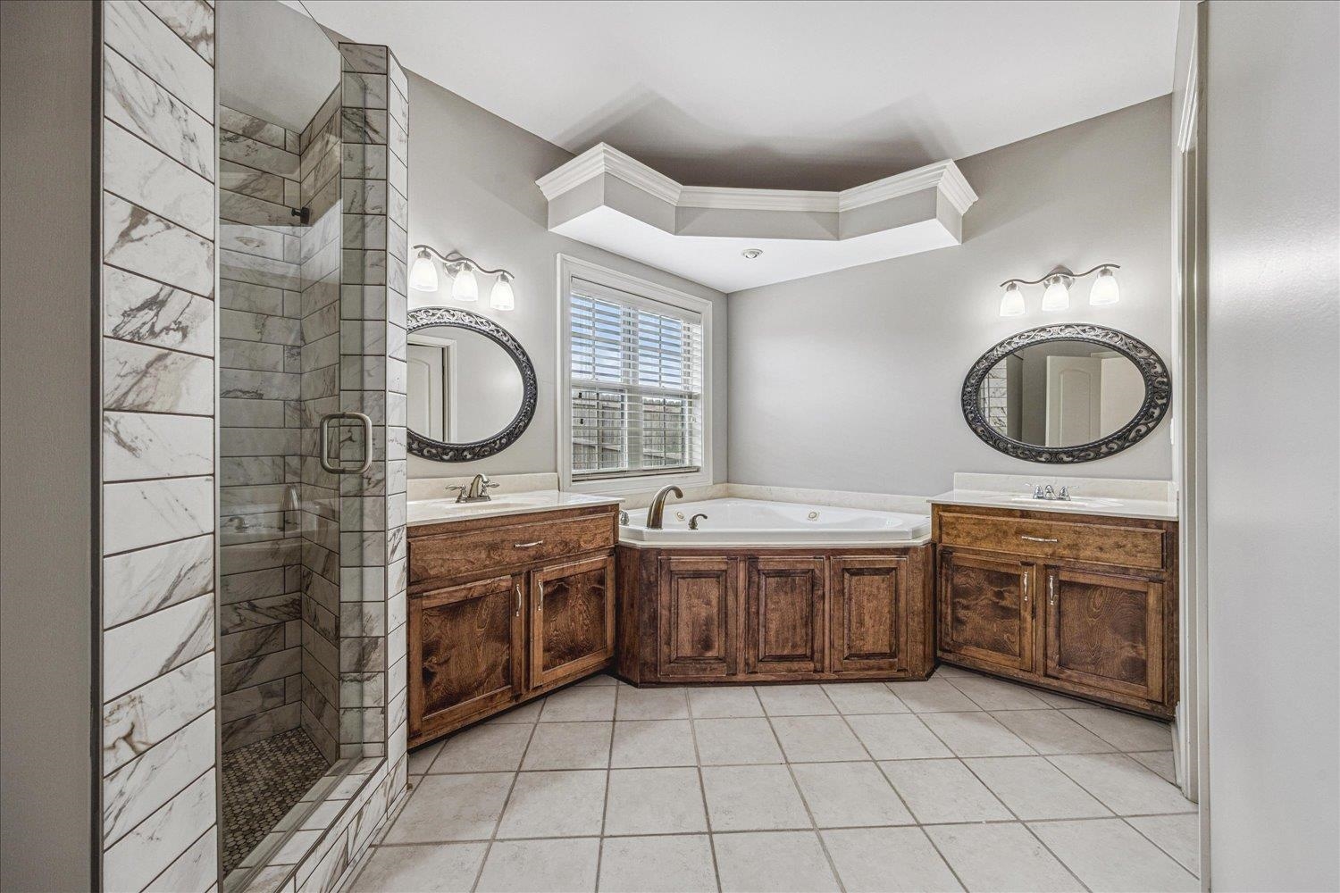 142 Clementine Road Atoka, TN 38004 - Photo 17 of 37 Updated shower, double vanities, walk in closet
