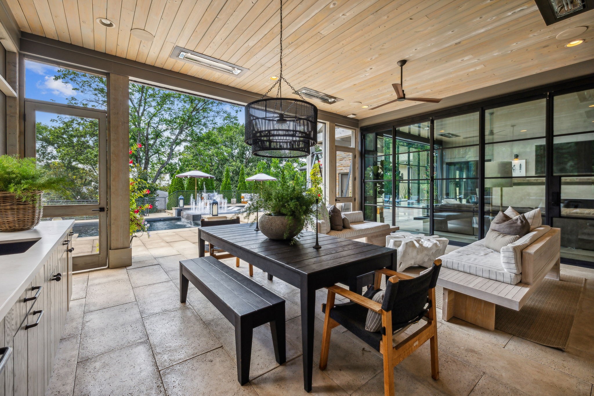 3401 Trimble Road Nashville, TN 37215 - Photo 20 of 55 a living room with furniture a flat screen tv and floor to ceiling window