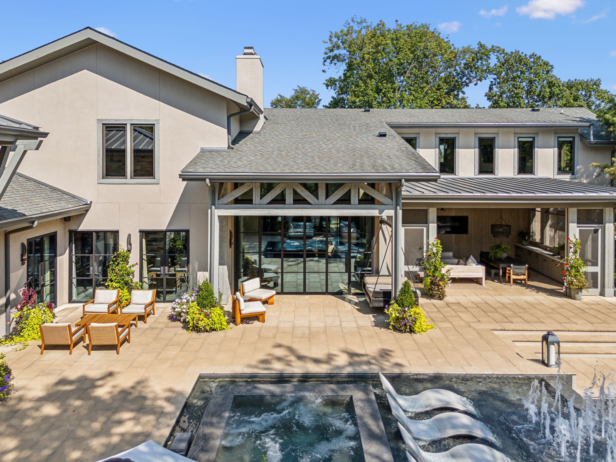3401 Trimble Road Nashville, TN 37215 - Photo 24 of 55 a view of a patio with dining table and chairs under an umbrella