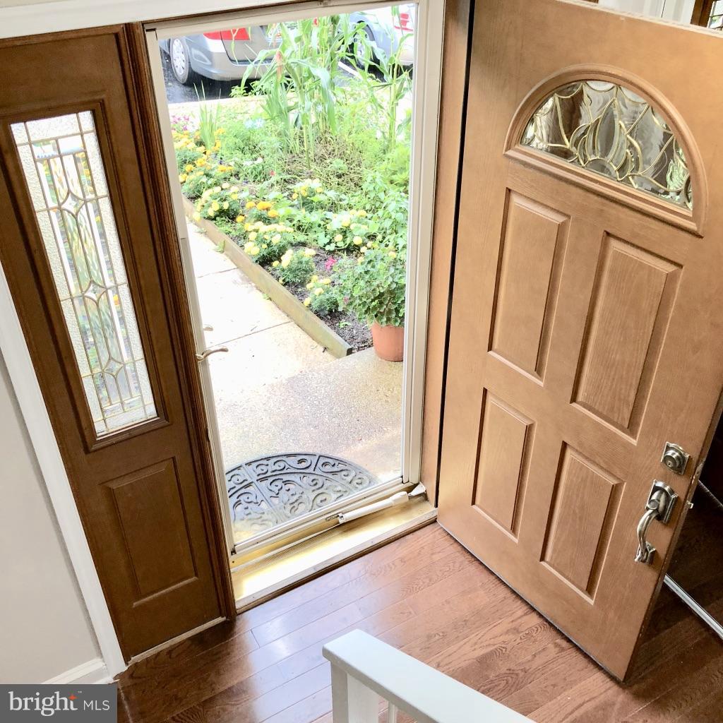 581 Summit Hall Road Gaithersburg, MD 20877 - Photo 2 of 22 a view of front door with wooden floor