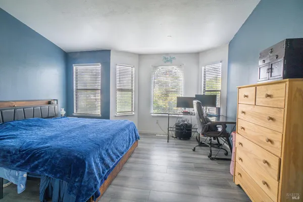 a bathroom with a toilet sink and shower