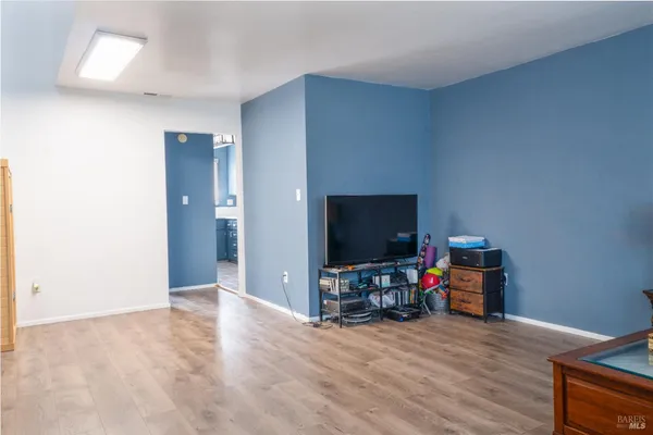 a view of a livingroom with a flat screen tv