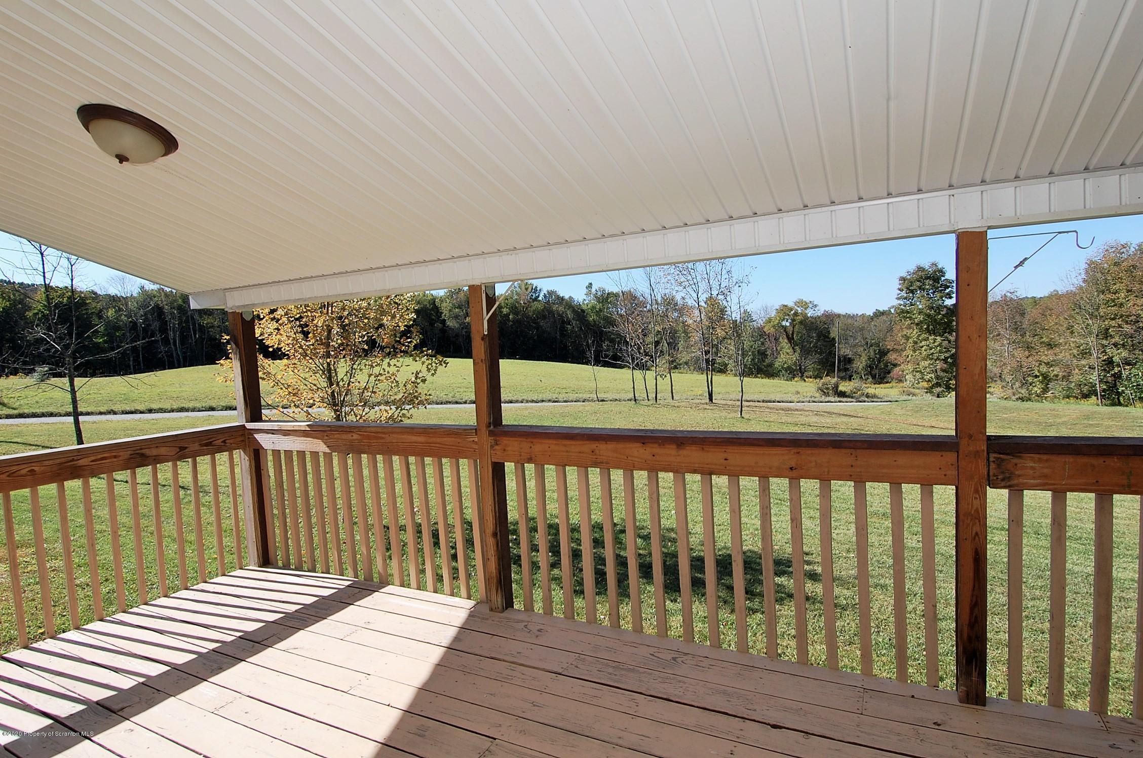 950 Red Abbott Road Union Dale, PA 18470 - Photo 4 of 34 Covered Porch